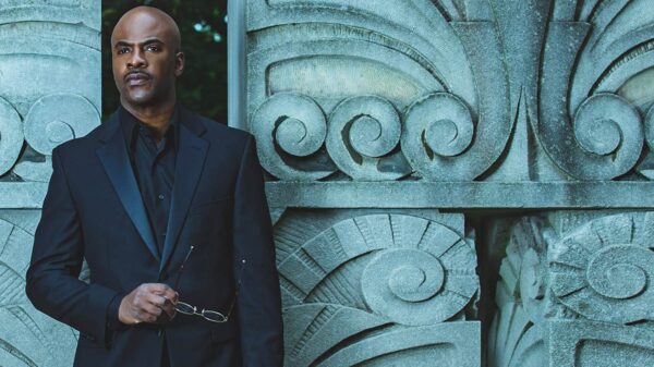 Maestro Fresh Wes, standing here, has released 2 new singles for his birthday - Rewind and Fast Forward