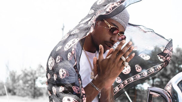 The photo features Toronto rapper NorthsideBenji who is promoting the new Toronto rapper NorthsideBenji releases new Frienemy EP.