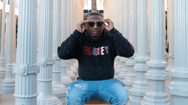 Photo of West Coast American rapper Ras Kass.