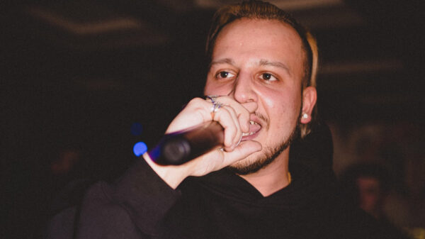Kresnt, pictured here holding a mic, is promoting a new single titled Everybody Knows