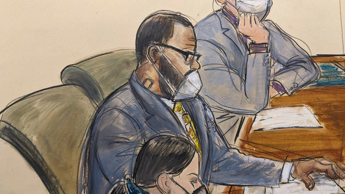 A courtroom sketch of R. Kelly sitting with attorneys (Image: AP Photo/Elizabeth Williams)
