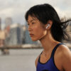 A runner wearing the new AirPods 3