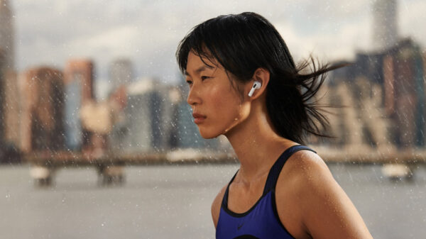 A runner wearing the new AirPods 3