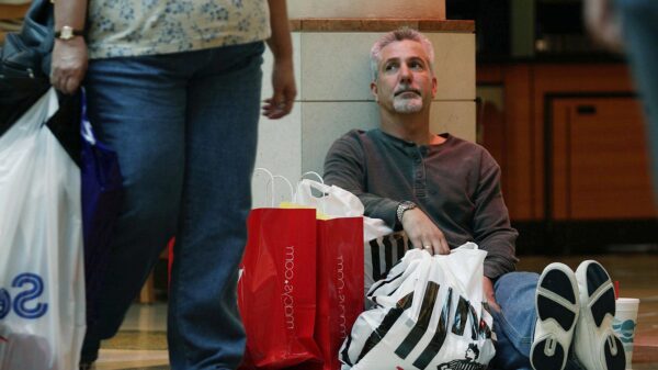 A tired and annoyed looking Christmas shopper