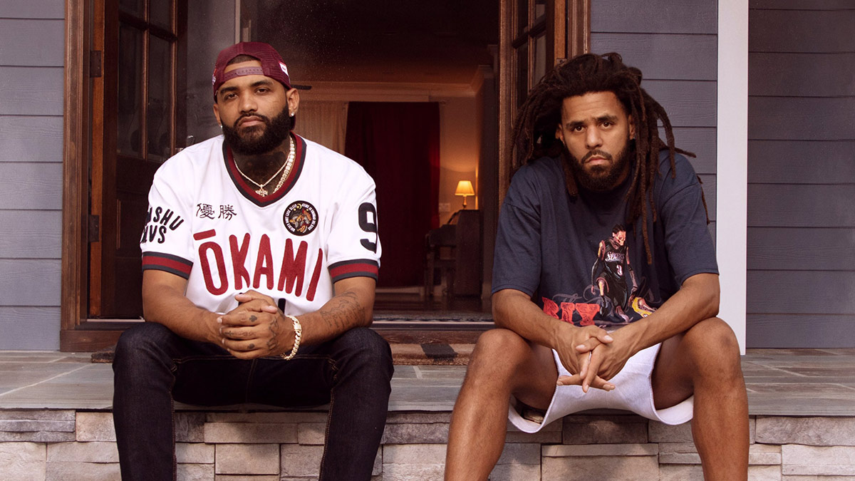 Libera Awards nominees Joyner Lucas and J. Cole sitting on stairs