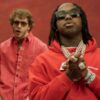 Jack Harlow and EST Gee stand together in the Backstage Passes video