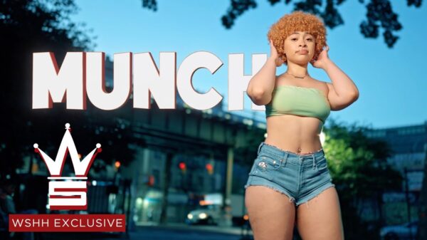 Bronx rapper Ice Spice has her hands in her hair with the title of the song Munch appearing behind her