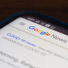 Google News can be seen on a mobile phone screen