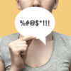 A woman with a conversational cloud in her hand and an obscenity symbol on it.