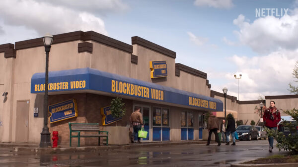 An outside view of a dead brands icon Blockbuster, a home video rental store.