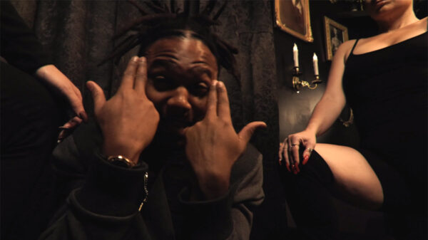 Pimpton in his music video for Off Top