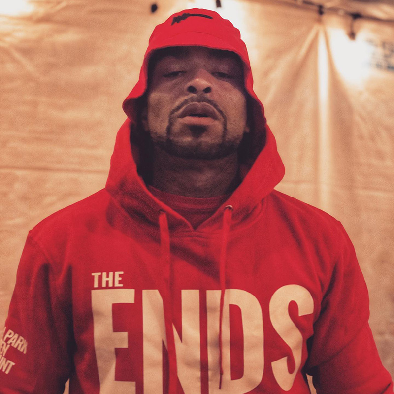 Rapper Method Man wearing a red hoodie by The Ends