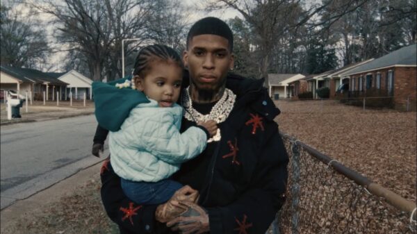Memphis rapper NLE Choppa holding his child
