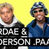 Rap stars Cordae and Anderson .Paak sit together in the Genius studio