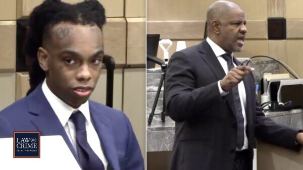 A photo of YNW Melly and his lawyer in court.