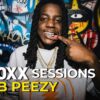Rapper OMB Peezy poses for the camera in the UPROXX studios during a performance of Think You Ready.