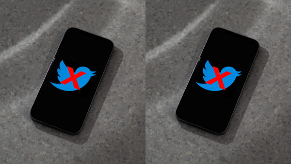 A mobile phone displaying the Twitter logo with a red X over it, signifying the end of Twitter
