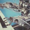 A robot playing the keyboard to represent the article's focus on how AI is changing music