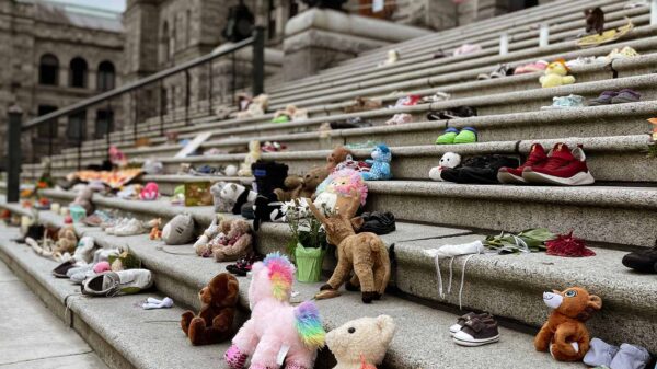 Plush toys left on the steps of a government building to honour missing Indigenous children in Canada.