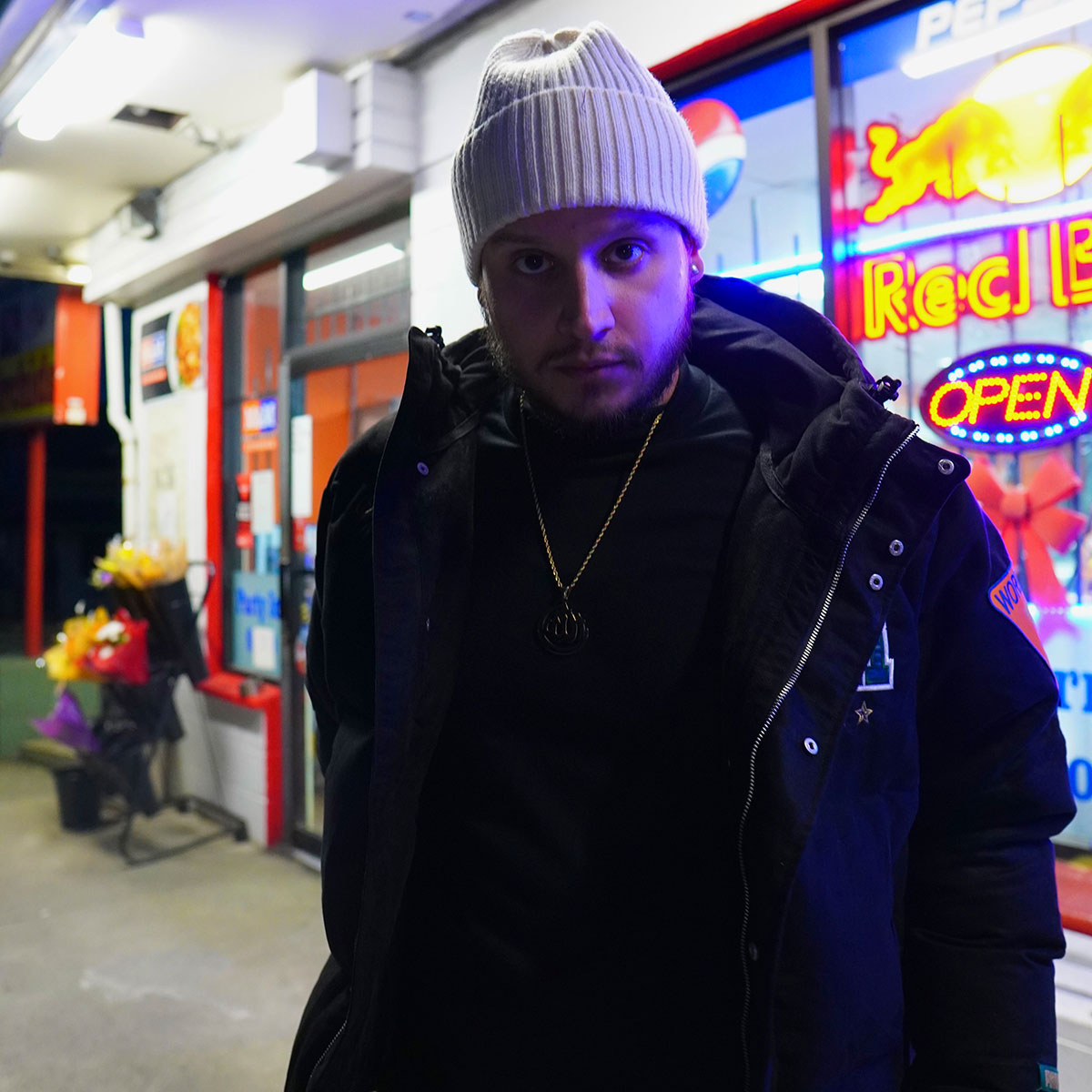 Rapper Kresnt poses for the camera outside of a store to promote his new album GOOD SPIRITS.