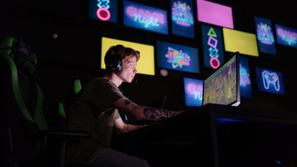 A man playing a video game on a computer.