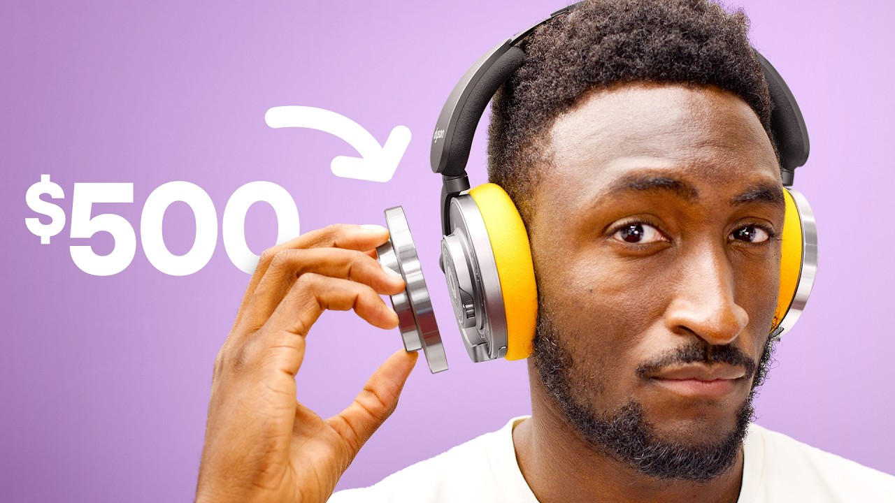 A picture of a young man wearing Dyson headphones on a purple backdrop.