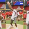 Ludacris throws the first pitch at an Atlanta Braves game.