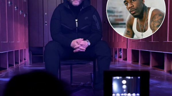 Peter Jackson and Dax, with a video camera in the foreground.