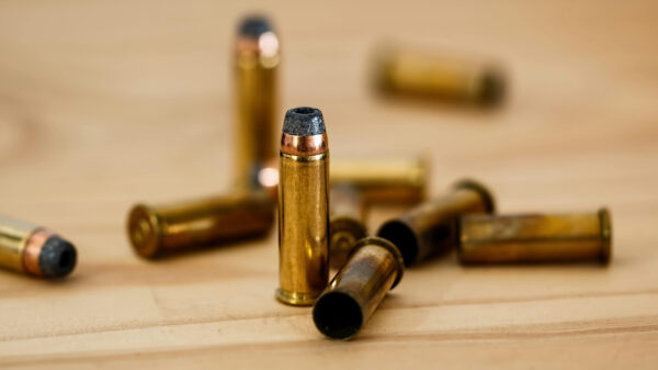 Bullets on a table, to represent American guns causing Cartel violence in Mexico.