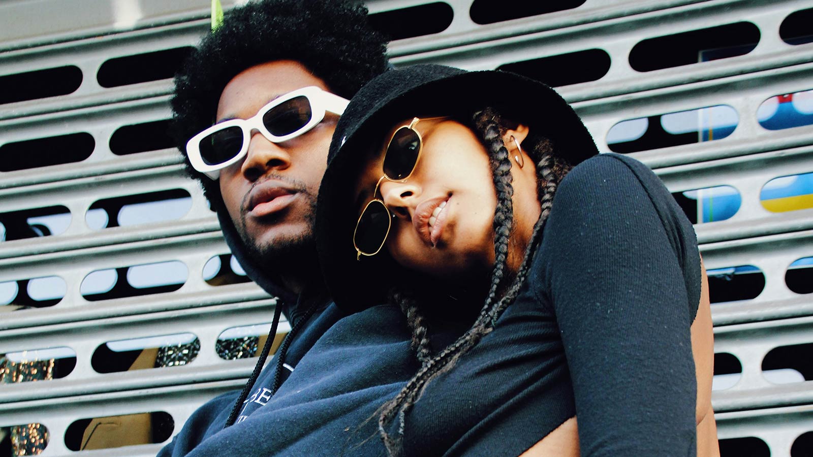 Two models posing, an example of Black fashion inspiring the Met Gala in 2025.