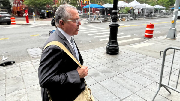 A lawyer walking to a courtroom for day 19 of the Diddy trial.
