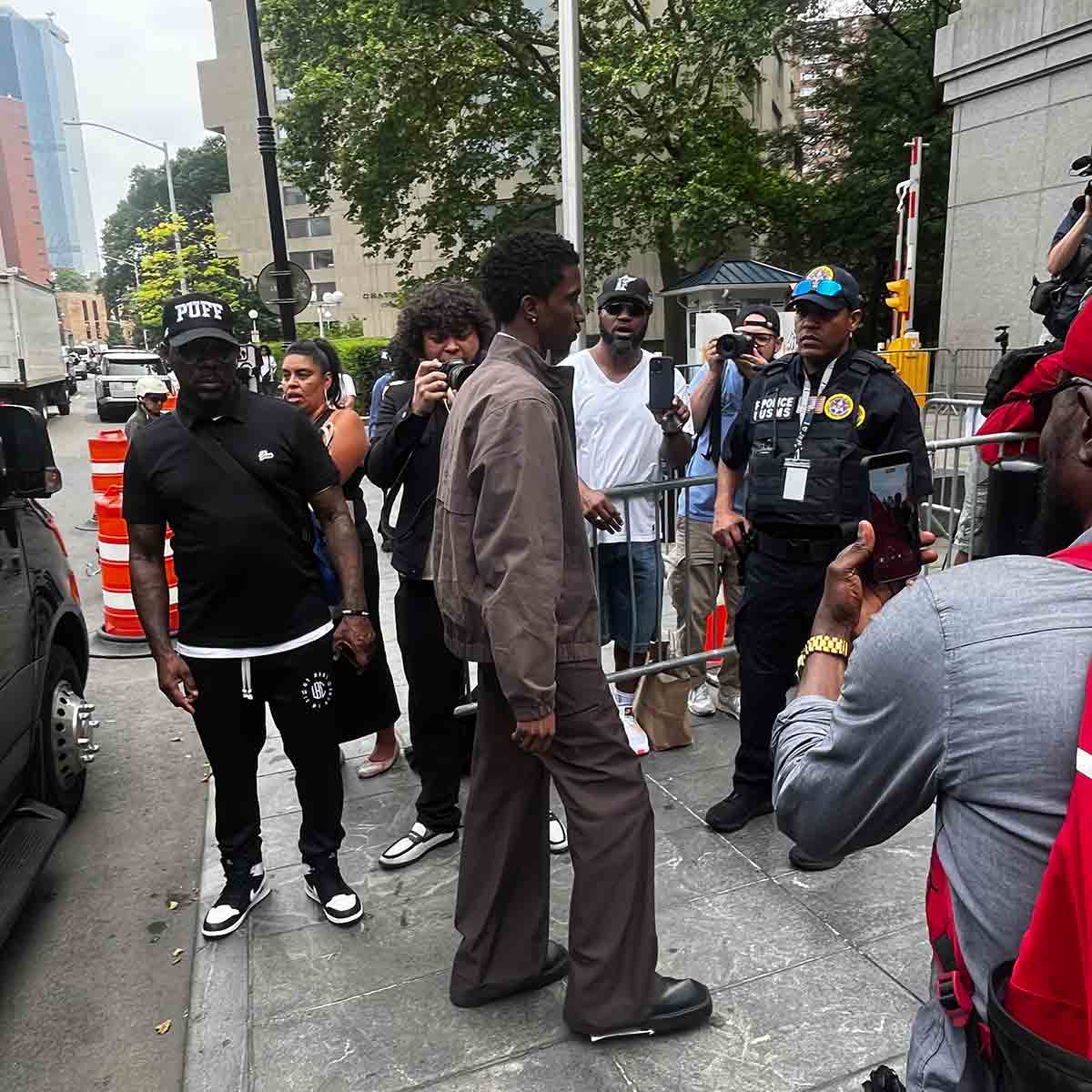 A media scrum outside the courthouse on day 23 of the Diddy trial