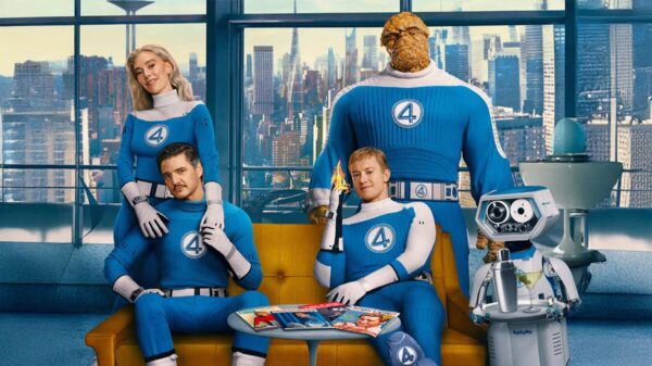 A promotional poster for the film Fantastic Four, with the four main characters posing for a group photo.