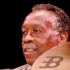 Former James Brown drummer Clyde Stubblefield sits behind his drums.