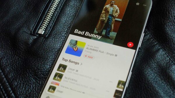 The Apple Music profile of Super Bowl halftime show star Bad Bunny is displayed on a mobile phone.