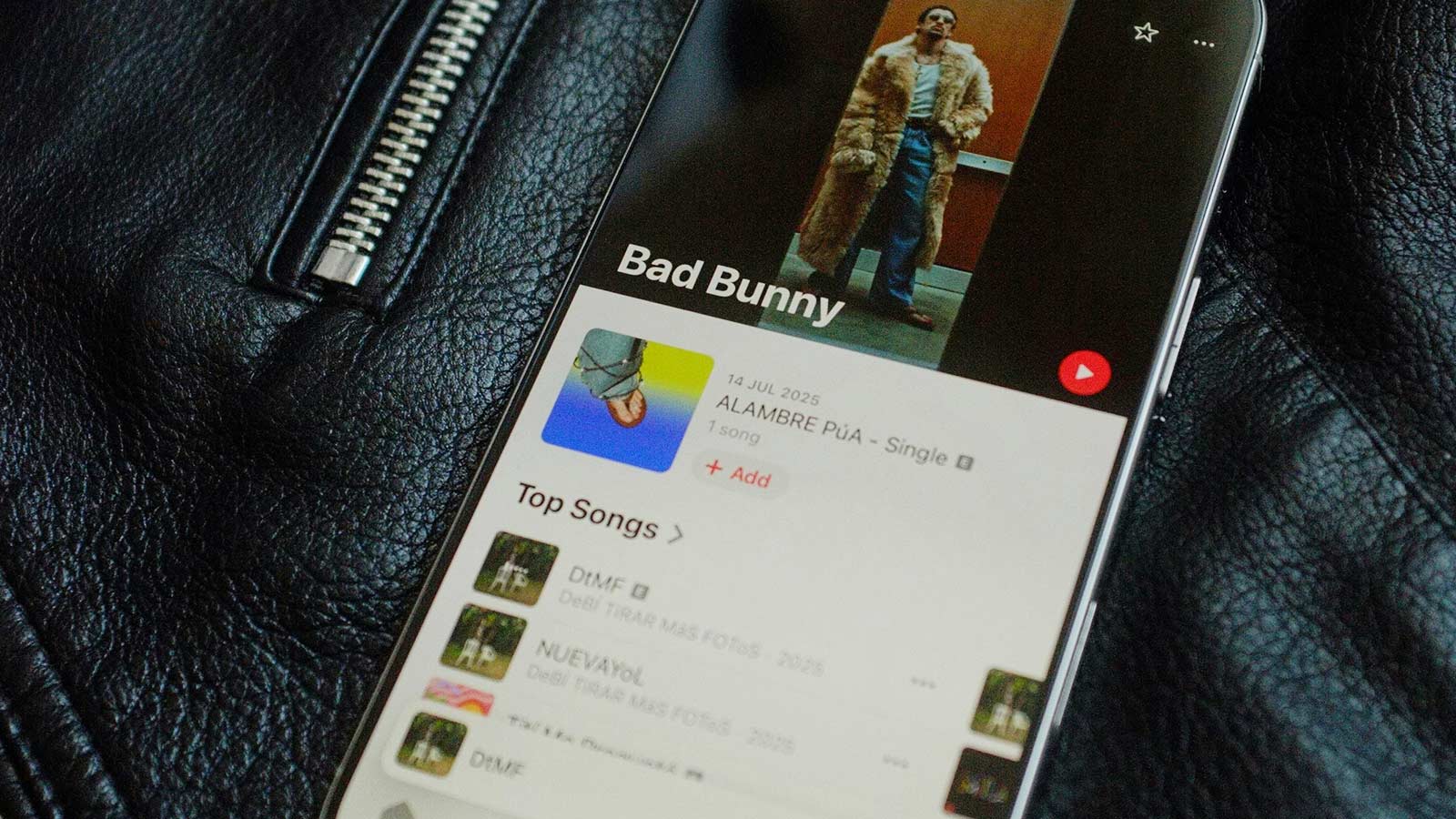 The Apple Music profile of Super Bowl halftime show star Bad Bunny is displayed on a mobile phone.