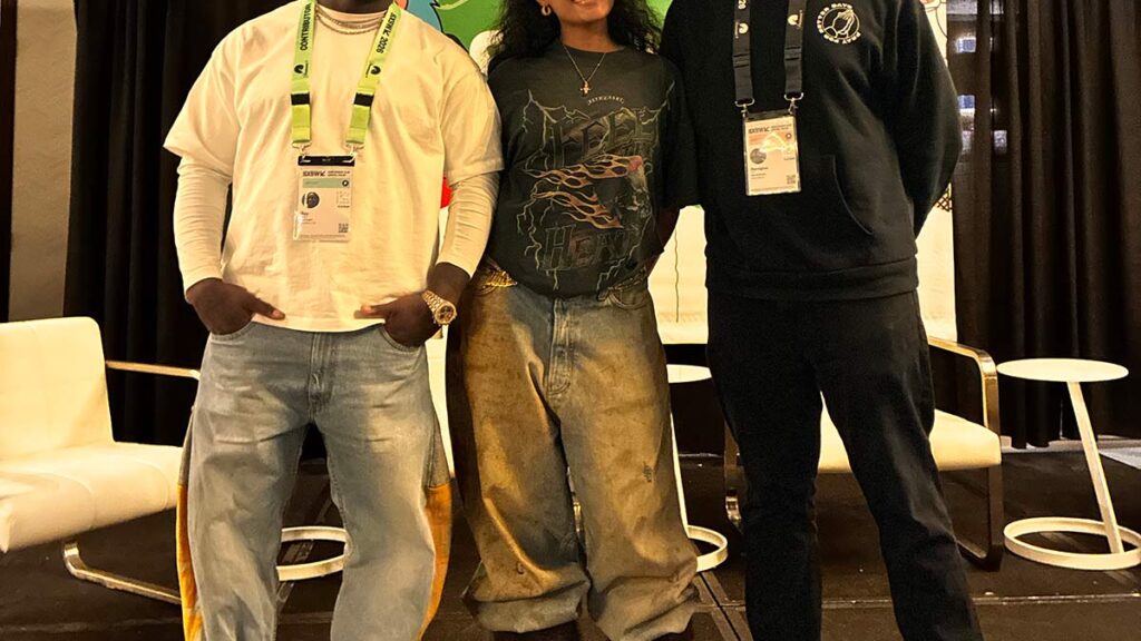 Ray Vaughn, Samara Cyn, and Remi Louis Harris pose for a group photo before an interview session.