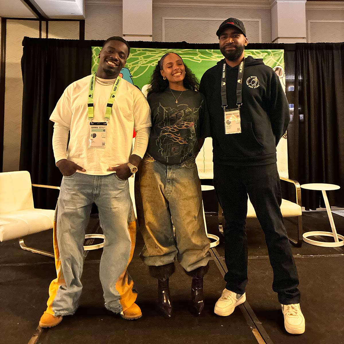 Three people posing for a group photo at SXSW, including the interview subject, Samara Cyn.