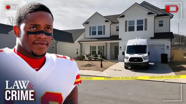 Former NFLer Darron Lee stands in front of the home at the centre of his murder case.