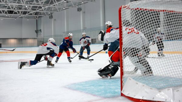 Canadian hockey players in action as report calls out systemic abuse in Canadian sport.