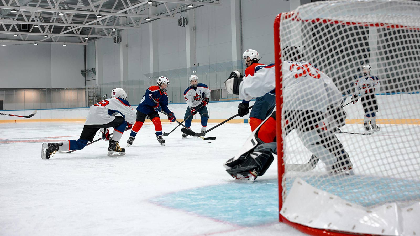 Canadian hockey players in action as report calls out systemic abuse in Canadian sport.