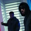 Preme and Bryson Tiller in a scene from the Countdown music video.