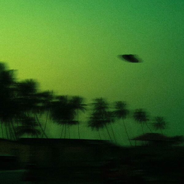 Dark sky with possible UFO shape tied to are aliens real discussion.