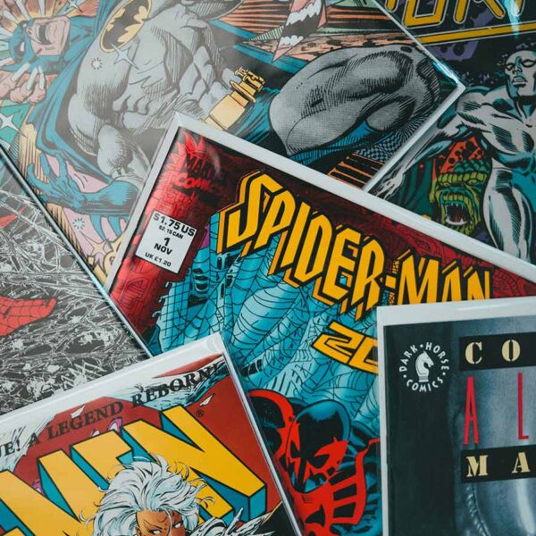 Vintage comic book covers displayed together, highlighting the rise of comics culture online and digital comics fandom.