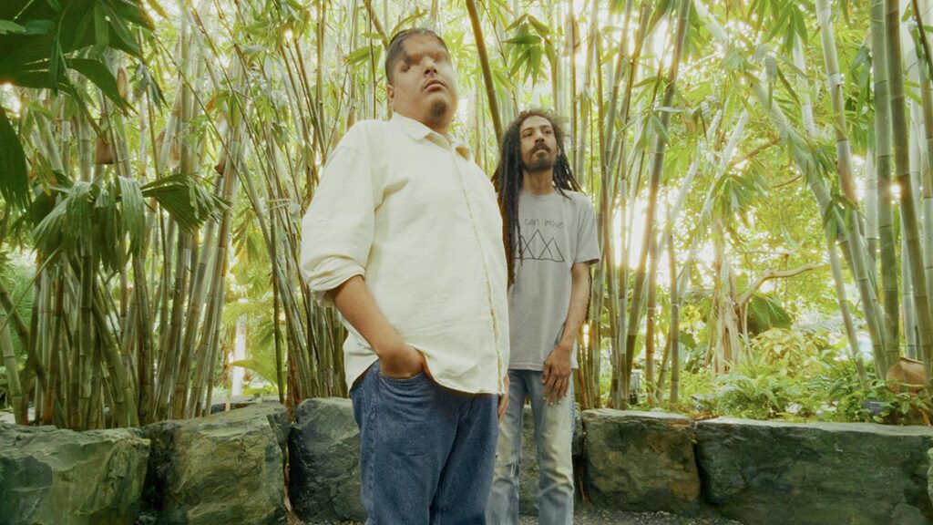Rappers Mattmac and QuestionATL pose together during a Smoke Signals photoshoot.