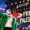 Macklemore performs onstage in support of a Free Palestine.
