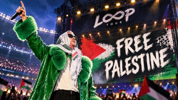 Macklemore performs onstage in support of a Free Palestine.