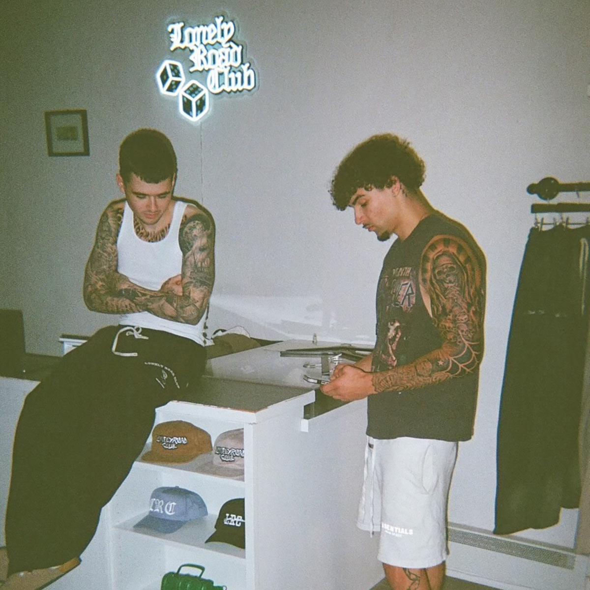 Employees inside the Lonely Road Club store in Victoria.